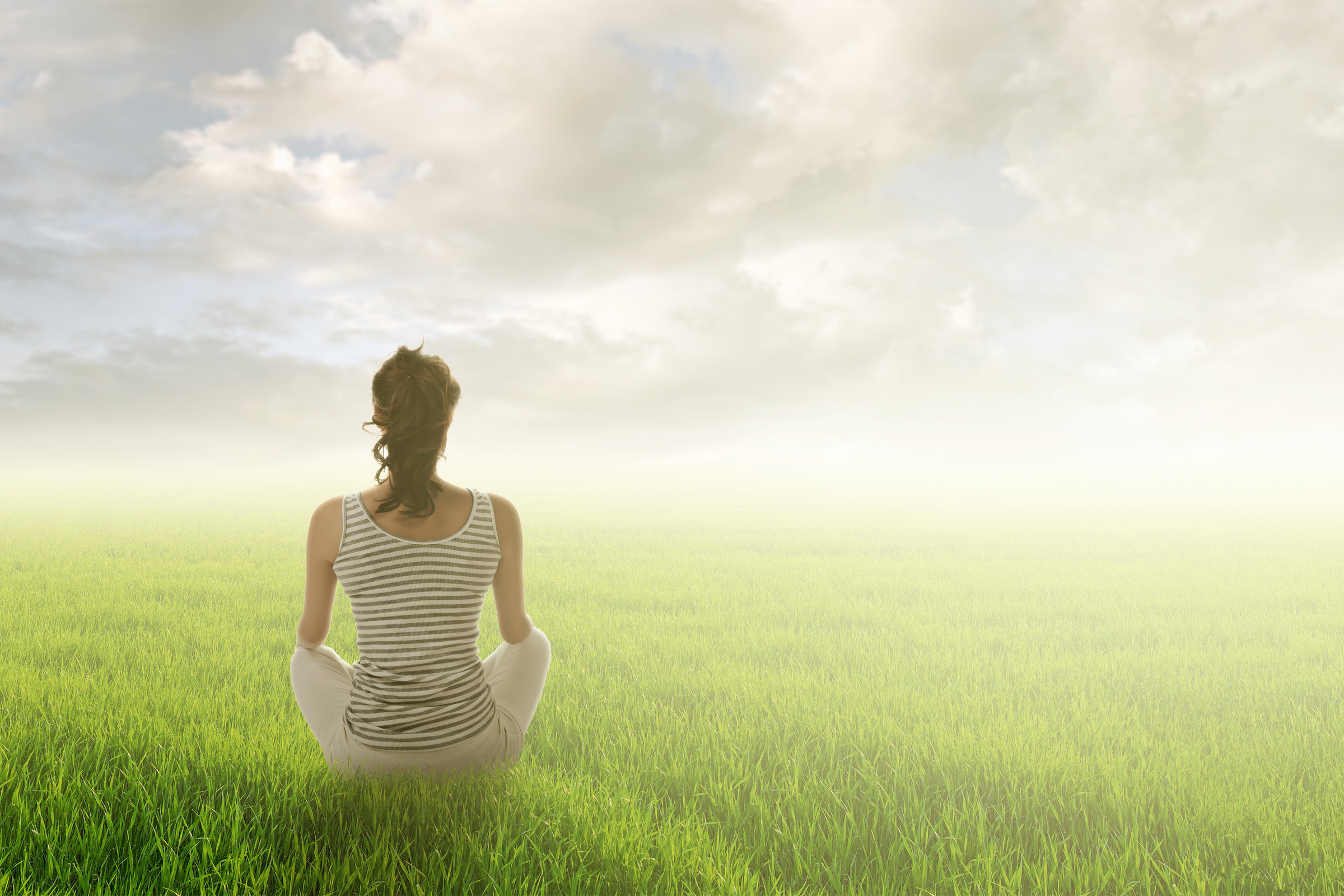 Woman Sit on Grassland